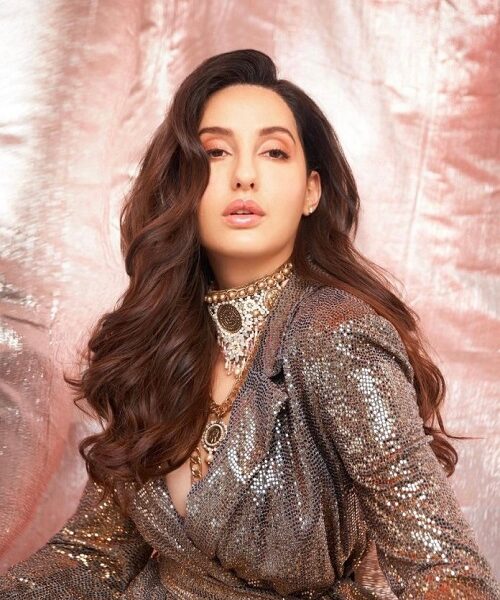 Nora Fatehi Wearing a Sequins Jacket With Stretch Pant From Badgley Mischka!