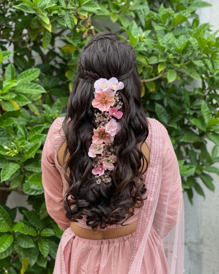 Back view of brown curls hair do for bride keeping flowers Stock Photo -  Alamy