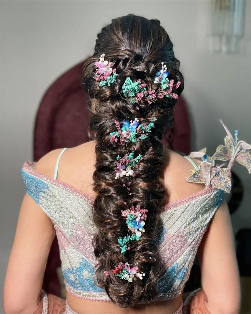 Unique And Beautiful Bridal Hair Style With Flower